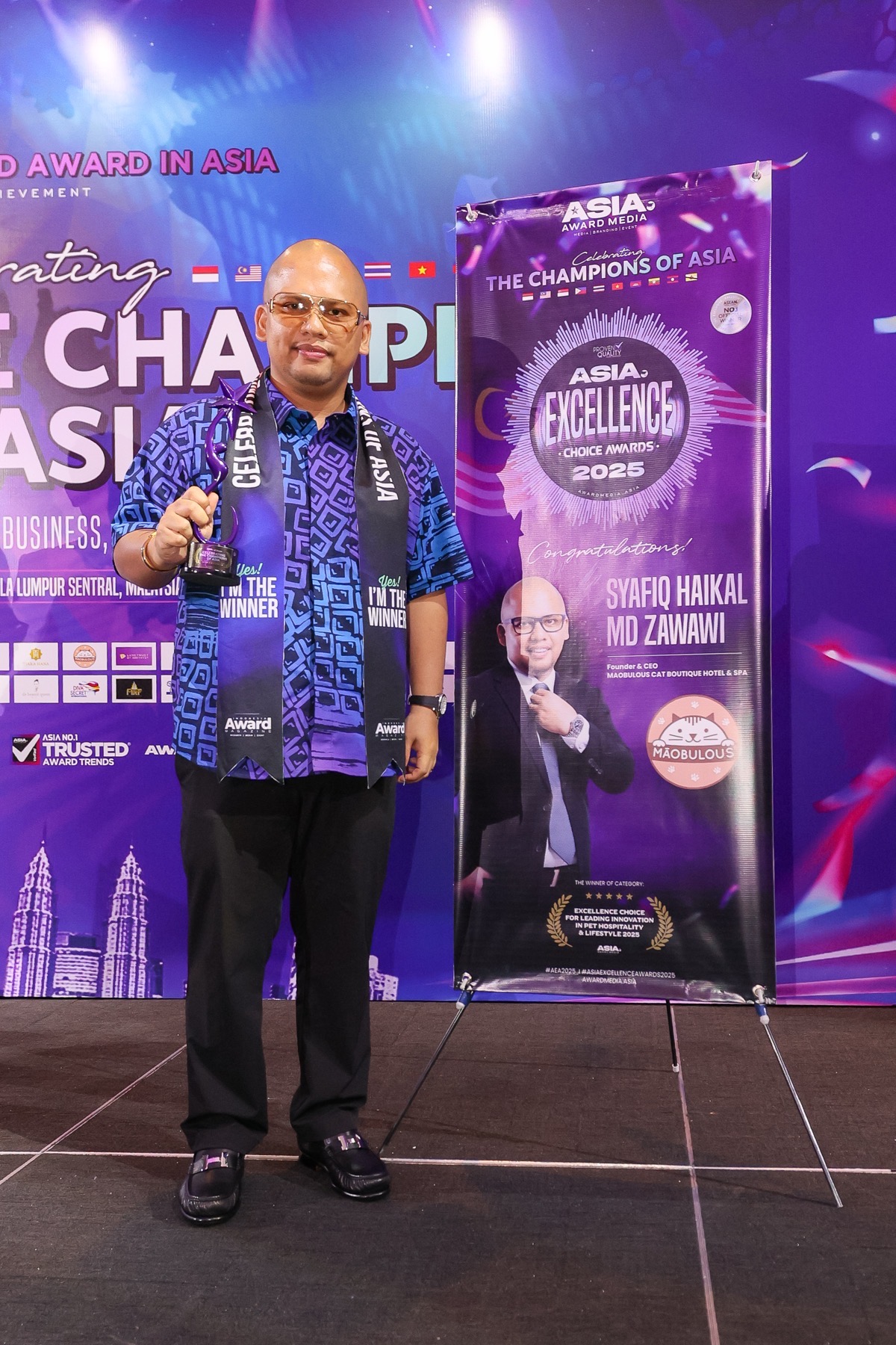 Syafiq Shamroz accepting the Asia Excellence Choice Award 2025 in Kuala Lumpur