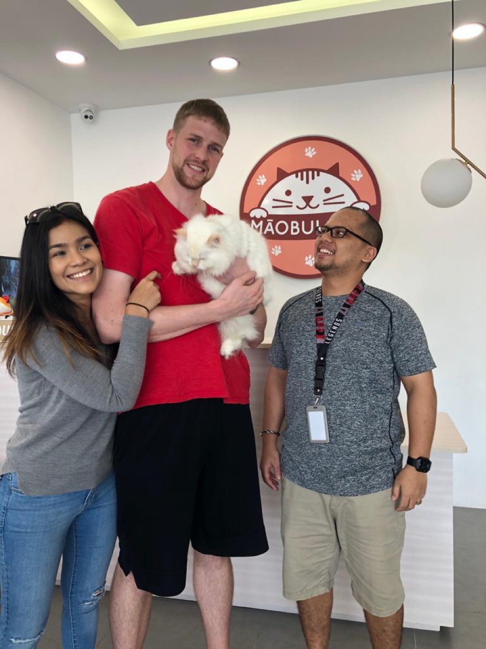Guest with their cat at Maobulous Cat Boutique Hotel & Spa