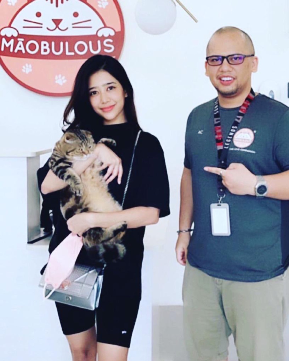 Guest with their cat at Maobulous Cat Boutique Hotel & Spa