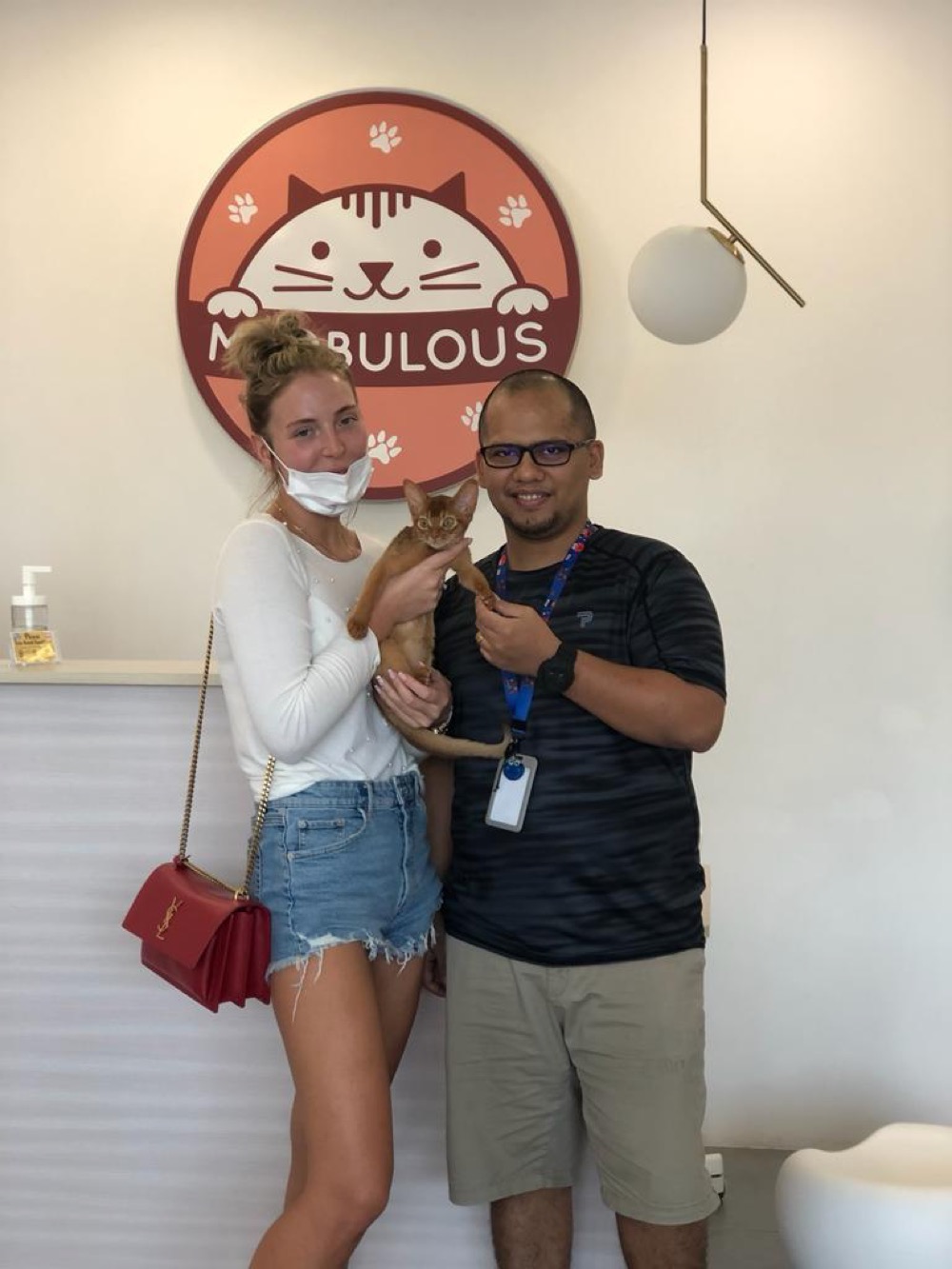 Guest with their cat at Maobulous Cat Boutique Hotel & Spa